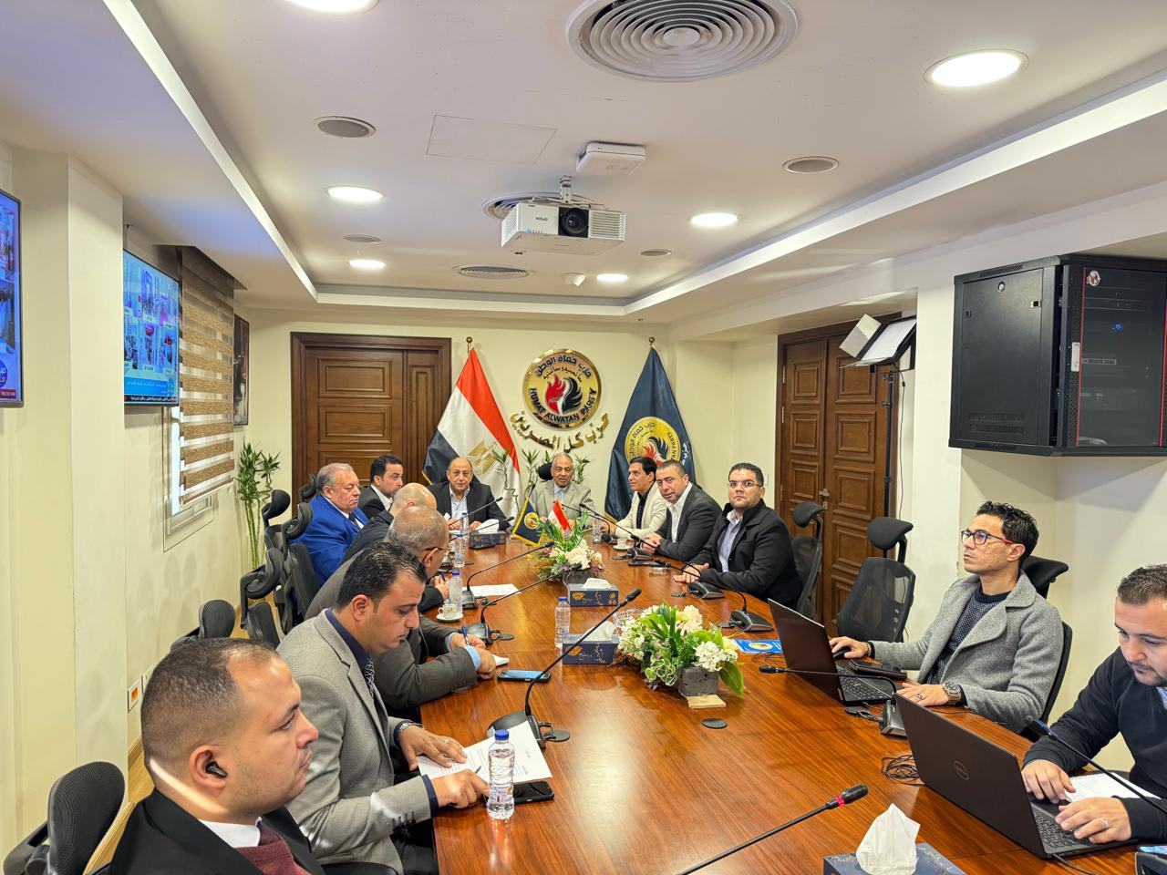 غرفة عمليات حماة الوطن تعاود الانعقاد لمتابعة التصويت بجولة الإعادة في 19 دائرة ملغاة غرفة عمليات حماة الوطن تعاود الانعقاد لمتابعة التصويت بجولة الإعادة في 19 دائرة ملغاة